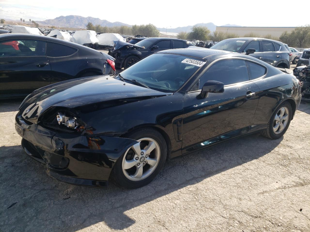 hyundai tiburon 2006 kmhhm65dx6u194636