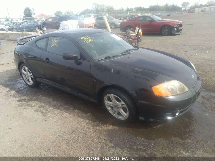 hyundai tiburon 2004 kmhhn65f04u144887