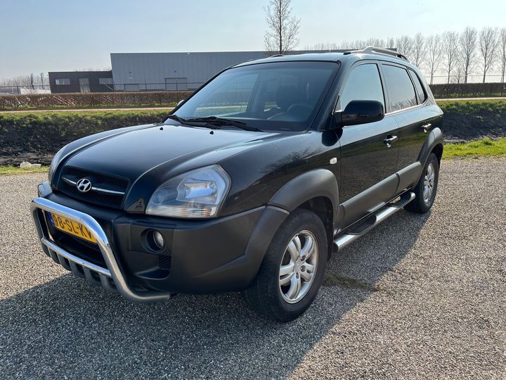 hyundai tucson 2006 kmhjn81bp6u350886