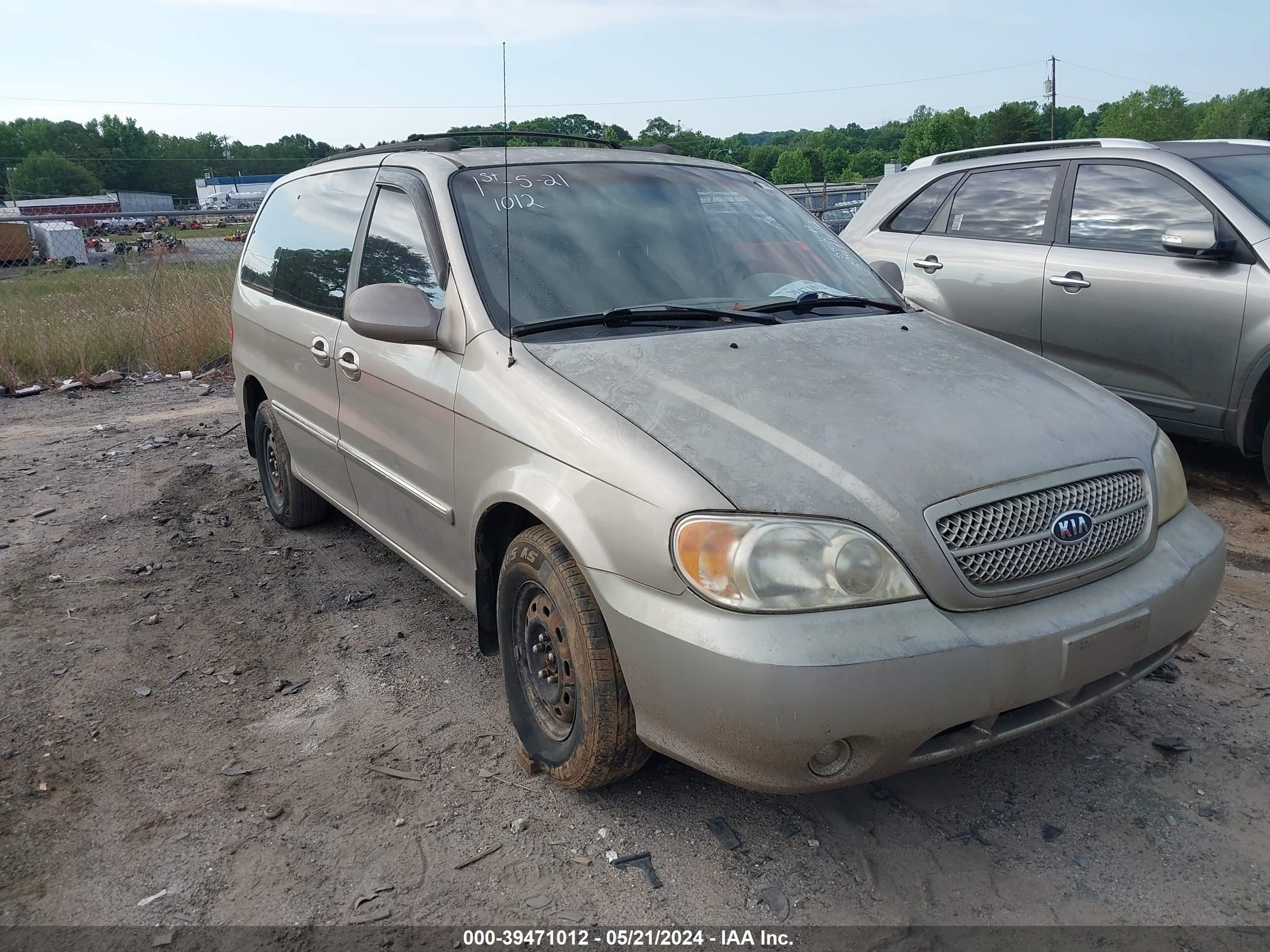 kia sedona 2004 kndup131746601884