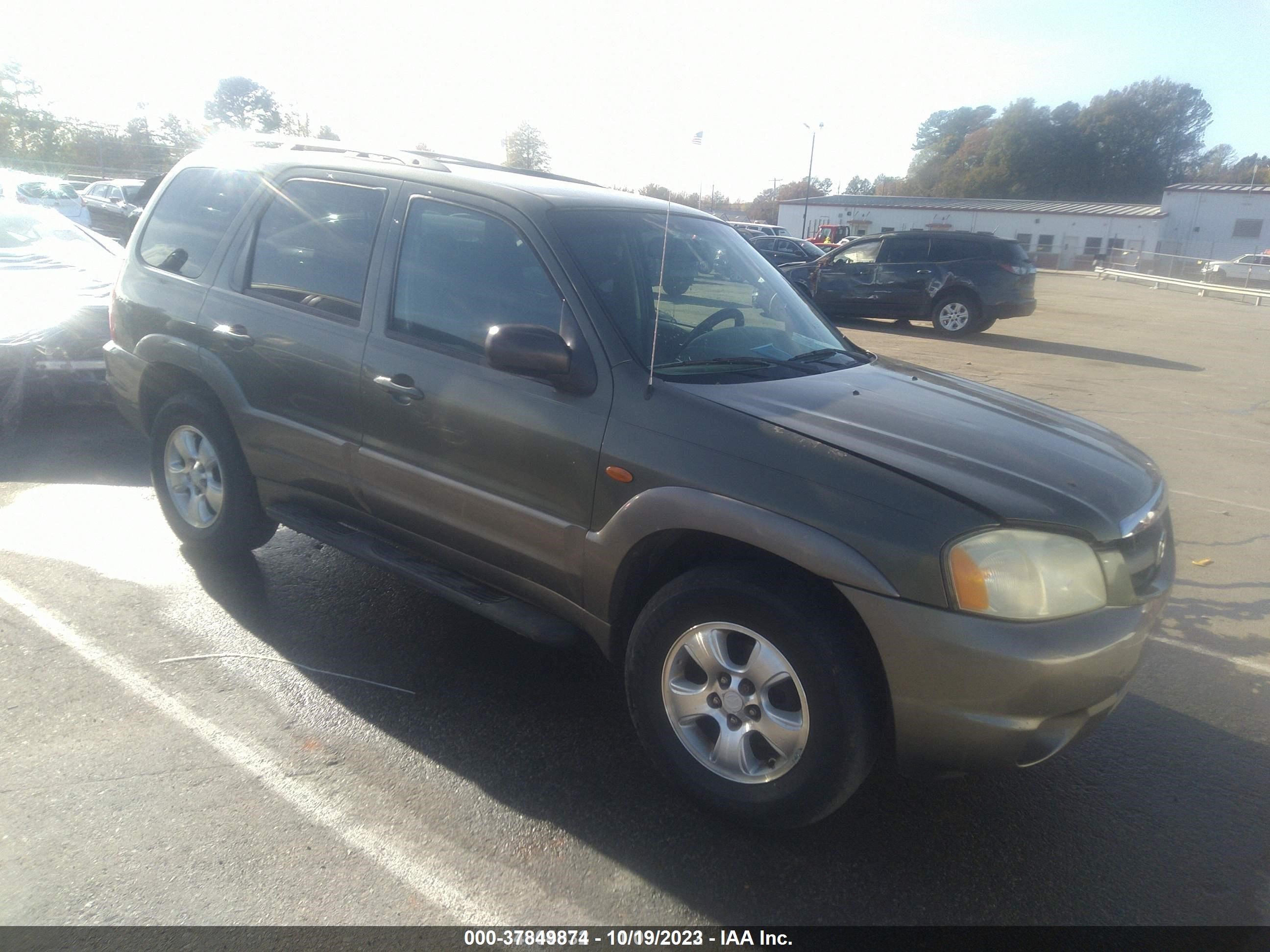 mazda tribute 2002 tmbbh25j793035421